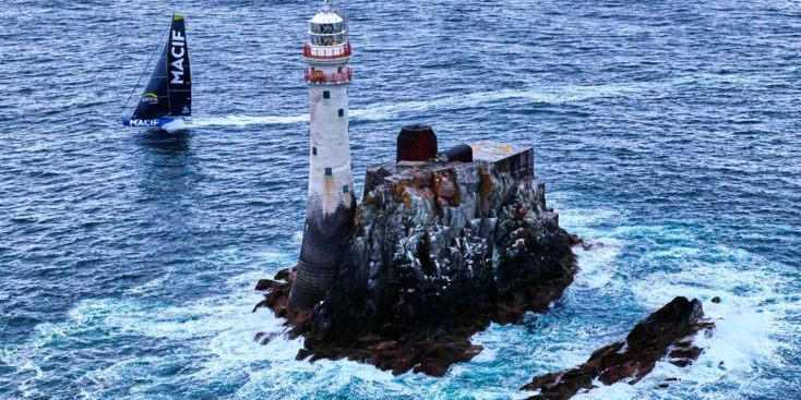 Charlie Dalin's IMOCA MACIF rounds the Fastnet Rock