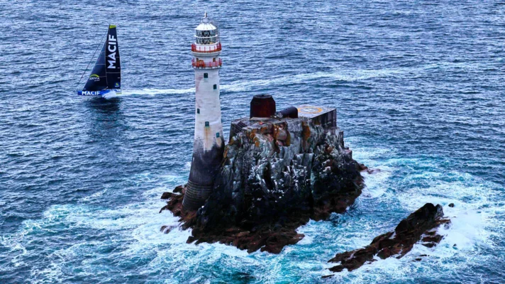 Charlie Dalin's IMOCA MACIF rounds the Fastnet Rock