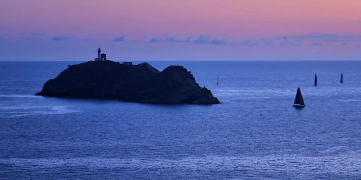 On the way to the finish line, the yachts go round the mythical Giraglia rock located at the northern tip of Corsica