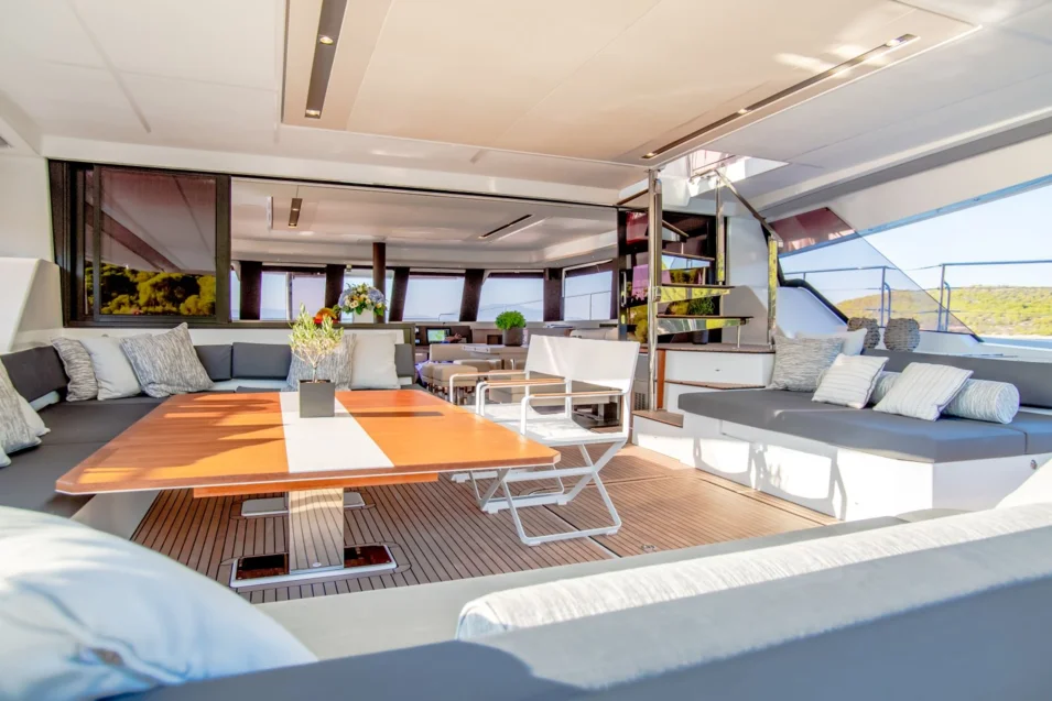 A really spacious aft cockpit and a saloon on Fountain Pajot Power 67 catamaran, which is less than 20 m