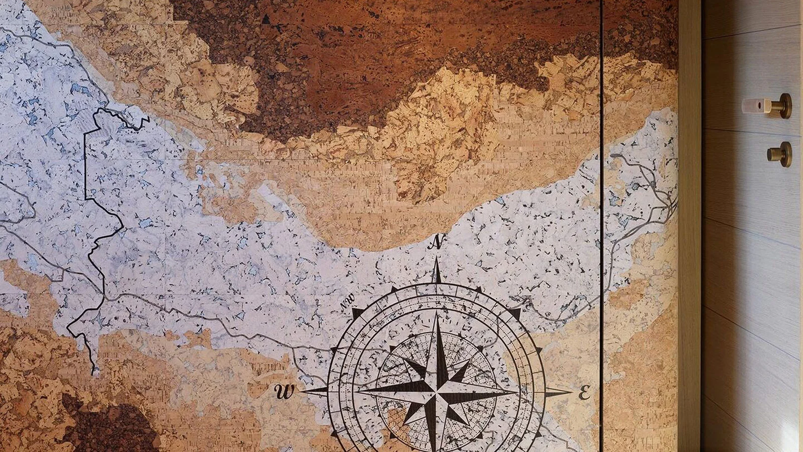 Bespoke cork marquetry map on board the СdM Nasiba
