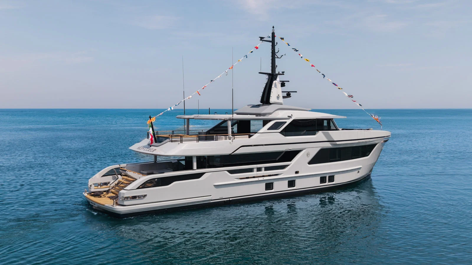 The CdM RJ102 Mon Coeur features a broad staircase leading to the water and swim platform
