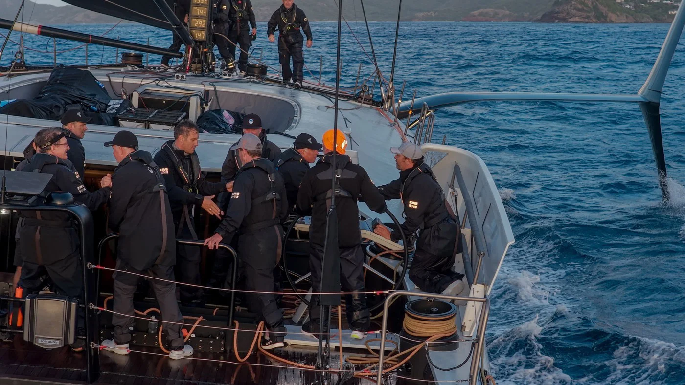 The Baltic 111 Raven's crew celebrating crossing the finish line