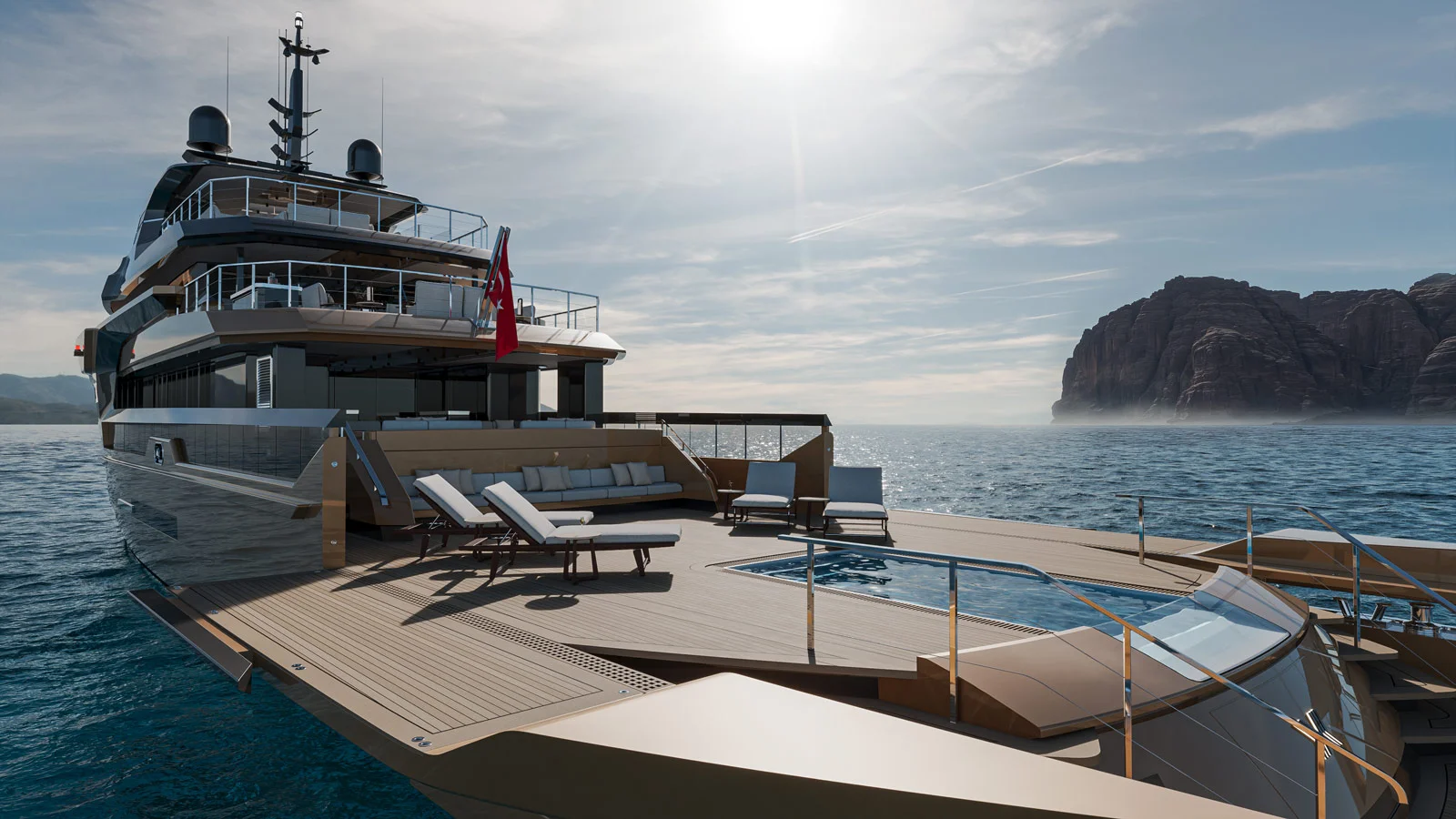 Aft lounging area with a pool on board the Petra Aura