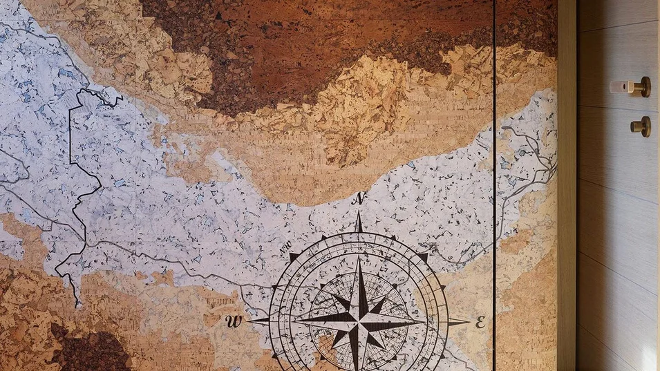 Bespoke cork marquetry map on board the СdM Nasiba